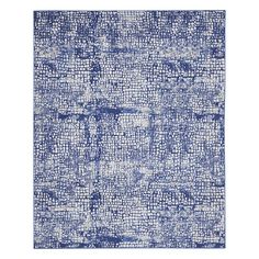 a blue and white rug with squares on it