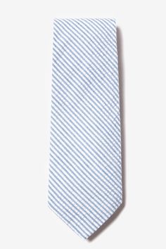 Seersucker Stripe Tie by The American Necktie Co Casual Summer Ties, White Cotton Ties For Summer, White Cotton Summer Ties, Striped Summer Tie, Blue Spring Tie, Elegant Light Blue Formal Ties, Classic Blue Party Ties, Striped Summer Ties, Classic Light Blue Formal Ties