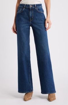 A hint of stretch softens subtly faded jeans designed in a wide-leg silhouette. 32" inseam; 11" front rise Zip fly with button closure Five-pocket style 77% cotton, 22% lyocell, 1% spandex Machine wash, dry flat Imported Wide Leg Jeans With Button Closure For Everyday, Classic Dark Wash Wide Leg Flare Jeans, Classic Wide Leg Denim Blue Flare Jeans, Classic Wide Leg Flare Jeans In Denim Blue, Classic Medium Wash Wide Leg Flare Jeans, Relaxed Fit Wide Leg Flare Jeans With Button Closure, Everyday Wide Leg Jeans With Button Closure, Dark Wash Cotton Wide-leg Flare Jeans, Classic Dark Wash Flare Jeans With Button Closure