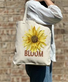 Sunflower Costume Tote Bag, Flower Tote Bag, Casual Tote Bag, Cute Tote, Nature Lover, Women Shoulder Shirt, Gift For Women, Tote Bag Aesthetic 🎉 Welcome to Our Eco-Chic Boutique! 🎉 💐 We're Absolutely Delighted to Have You! 💐 Diving into our boutique feels like uncovering a secret garden of treasures, all thoughtfully selected with you in mind. Our mission is to fill your world with joy and satisfaction, handpicking each piece to ensure your shopping journey with us is nothing short of wonde Yellow Canvas Bag As Gift, Sunflower Costume, Sunflower Tote Bag, Bridesmaid Tote Bags, Bachelorette Gift, Flower Tote, Bag Flower, Casual Tote Bag, Bag Aesthetic