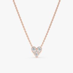 Riley Cherish a symbol of love and enduring affection with this delicate Diamond Inlay Heart Necklace. This exquisite piece features a classic heart-shaped pendant, meticulously crafted from solid 14k gold (available in yellow, white, or rose gold). The highlight of the pendant are the sparkling diamonds inlay, adding a touch of brilliance and timeless elegance. - Handmade- Solid Gold- Natural Diamonds - G Color, SI Quality Diamonds- Pendant Size: 6.5 mm- Total Diamond Carat Weight: 0.25 ctw All Classic Heart Shaped Pendant Necklace For Valentine's Day, Classic Valentine's Day Heart Pendant Necklace, Classic Brilliant Cut Heart Necklace For Valentine's Day, Timeless Necklaces For Valentine's Day, Classic Valentine's Day Heart Necklace With Brilliant Cut, Classic 14k Gold Heart-cut Necklace, Classic Diamond Necklace With Heart Charm For Wedding, 14k Gold Heart Necklaces With Brilliant Cut, Classic 14k Gold Heart Cut Necklace