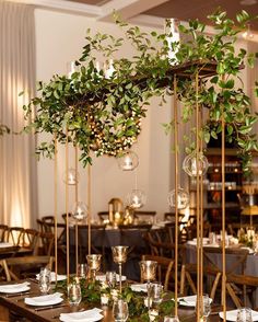 an image of a table setting with greenery on it