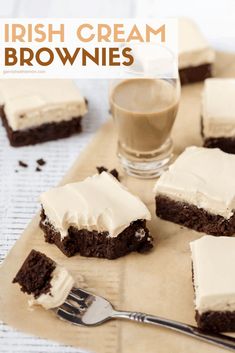 several pieces of cake sitting on top of a cutting board next to a glass of milk