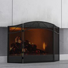 a fire place sitting on the side of a building