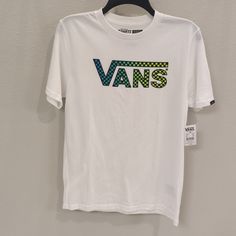 Boys Large. Nwt. 100% Cotton. White Cotton Vans T-shirt, Vans Letter Print T-shirt For Summer, Vans White T-shirt With Graphic Print, White Vans T-shirt With Graphic Print, Vans White Crew Neck T-shirt, White Vans T-shirt For Summer, White Short Sleeve Vans Tops, White Graphic Print Top By Vans, Casual White Vans Tops