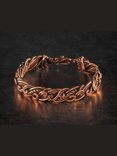 Wire wrapped bracelet, Unique 7th 22nd Anniversary gift idea, Art Nouveau antique style, One of kind braided statement bangle, Handmade oxidized pure copper jewelry, Pain relief, EMF protection   ❂ The bracelet is made of pure copper wire. The copper is artificially aged with patination, which gives an antique look and makes the details of the bracelet more expressive. After patination, the bracelet was polished to a shine, which gives a beautiful aesthetic appearance to the bracelet. The bracel