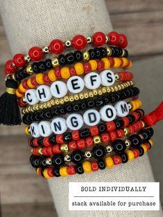 PLEASE READ ITEM DESCRIPTION BEFORE ORDERING! WE ARE NOT RESPONSIBLE FOR ORDERING MISTAKES! The ultimate bracelet listing for any Kansas City Chiefs Kingdom fan! Win that Dynasty! This is our BLACK set! We also offer a WHITE set! Here's a link for the WHITE set: https://www.etsy.com/listing/1782515149/kansas-city-chiefs-bracelets-chiefs These bracelets are SOLD INDIVIDUALLY unless purchased as a STACK! If wanting multiple bracelets, please add each one individually to your cart! Bracelets with letter beads can be personalized to exchange for a different word/name or player number. Please use the personalization box if wanting this; otherwise, your bracelet will come as pictured! PERSONALIZATION *ONLY* APPLIES TO BRACELETS THAT ARE PICTURED WITH LETTERING BEADS! If you are wanting another b Stanley Decor, Chiefs Kingdom, Football Bracelet, Sport Theme, Multiple Bracelets, Bracelets Handmade Diy, Chiefs Football, Crafty Mama, Kc Chiefs