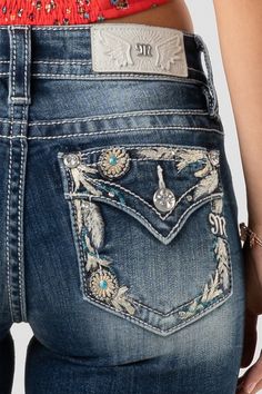 Relax in this pair of mid rise dark wash bootcut jeans detailed with a border embroidery design, studded trim and a faux flap pocket with rhinestone rivets. 98% Cotton, 2% Elastane Machine Wash Separately In Cold Water With Like Colors Front Rise: 9"; Back Rise: 14” Inseam: 34" Style No. M3909B-K1126 Border Embroidery Design, Dark Wash Bootcut Jeans, Classic Style Outfits, Nike Pro Shorts, Border Embroidery Designs, Border Embroidery, Dark Blue Jeans, Miss Me Jeans, Nike Pros