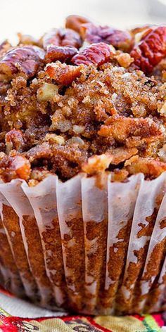 pumpkin pecan muffin in a muffin cup on a towel Sweet Potato Pumpkin Muffins, Pecan Muffins Recipe Brown Sugar, Pumpkin Nut Muffins, Muffin Breakfast Ideas, Pecan Crumble Topping Recipe, Hearty Muffins, Pumpkin Pecan Muffins, Delicious Thanksgiving Desserts, Muffins Pumpkin