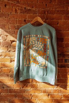 Gorgeous vintage/washed looking pigment dyed crewneck, locally printed in Baltimore, Maryland, is offered in three oversized sizes to ensure a perfect fit for everyone. Crafted for comfort and durability, it features an 80% cotton, 20% polyester blend. Manufactured in China by a WRAP certified factory, you can feel good about wearing this ethically-produced piece. Embrace easy, stylish comfort with a crewneck that aligns with Gardenbelle Shop's commitment to quality and sustainability. Model is Relaxed Fit Hand Printed Crew Neck Top, Hand Printed Crew Neck Top With Relaxed Fit, Bohemian Crew Neck Sweatshirt With Relaxed Fit, Bohemian Crew Neck Relaxed Fit Sweatshirt, Bohemian Relaxed Fit Crew Neck Sweatshirt, Gardenbelle Shop, Mushroom Nature, Free Soul, Free Spirit Style