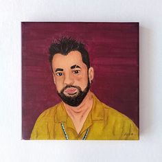 a painting of a man with black hair and beard wearing a yellow button up shirt