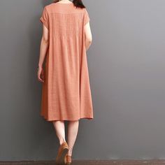 Orange cotton dresses summer short sleeve maxi dressThis dress is made of cotton linen fabric, soft and breathy, suitable for summer, so loose dresses to make you comfortable all the time.Measurement: Size M length 100cm / 39" Bust 100cm / 39" Shoulder 37cm / 14.43" Waist 128cm / 49.92" Sleeve Length 11cm / 4.29" Armhole 44cm / 17.16" Size L length 101cm / 39.39" Bust 104cm / 40.56" Shoulder 38cm / 14.82" Waist 132cm / 51.48" Sleeve Length 12cm / 4.68" Armhole 46cm / 17.94"Materials used: Cotton Orange Short Sleeve Sundress Maxi Dress, Orange Short Sleeve Maxi Sundress, Orange Short Sleeve Sundress, Orange Sundress With Short Sleeves, Casual Orange Short Sleeve Maxi Dress, Casual Orange Maxi Dress With Short Sleeves, Summer Short Sleeve Solid Color Maxi Dress, Summer Maxi Dress With Short Sleeves In Solid Color, Summer Cotton Midi Length Short Sleeve Dress