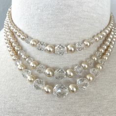 Excited to share the latest addition to my #etsy shop: Art deco pearly crystal necklace #artdeco #midcenturyjewelry #giftsforawife #giftsforsister #giftsformom #giftsforwife #giftsforaunt Vintage Faceted Necklaces For Wedding, Vintage Faceted Wedding Necklaces, Elegant Adjustable Faceted Pearl Necklace, Elegant Adjustable Pearl Necklace With Faceted Beads, Elegant Adjustable Polished Beads Choker, Vintage Adjustable Pearl Choker, Elegant Pearl Necklace With Spacer Beads For Wedding, Elegant Pearl White Necklace With Spacer Beads, Elegant Faceted Pearl Necklace