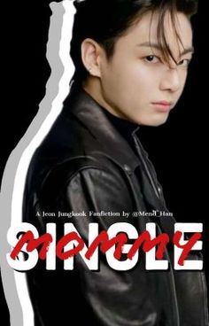 a young man in black jacket standing next to a white and red sign that says dingole