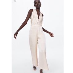 Size Medium Has Tag Xs Doesn’t But It’s New V-Neck Wide Leg Back Hidden In-Seam Zipper Closure Sleeveless Beige Jumpsuit For Night Out, Beige V-neck Jumpsuits And Rompers For Night Out, Chic Zara V-neck Jumpsuits And Rompers, Zara Sleeveless Jumpsuits For Date Night, Jumpsuit Mango, Crochet Romper, Pleated Jumpsuit, Satin Jumpsuit, Zara Jumpsuit