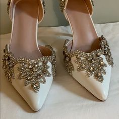 Beautiful Ladies White Pimps With Crystal Embellishment. Purchased For My Wedding But Lost Too Much Weight To Wear Them. Elegant Embellished Heels For Wedding, White Embellished Heels For Wedding Reception, Fitted White Wedding Shoes With Rhinestones, Rhinestone Wedding Shoes For Bridal Shower, Elegant White Embellished Wedding Shoes, Elegant White Wedding Shoes With Rhinestones, White Embellished Wedding Shoes For Formal Occasion, Formal White Embellished Wedding Shoes, Glamorous White Wedding Shoes