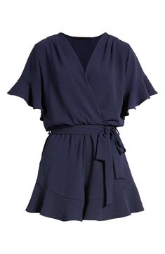 Fluttering sleeves frame this surplice-neck romper designed with a tie waist and soft ruffles. 32" length; 2 1/2" inseam; 35" leg opening (size Medium)
 Surplice V-neck Short sleeves Partially lined 100% polyester Hand wash, line dry Imported Chic Wrap Dress With Tie Waist And Flutter Sleeves, V-neck Belted Jumpsuits And Rompers For Vacation, Belted V-neck Jumpsuits And Rompers For Vacation, Belted V-neck Jumpsuit For Vacation, Flowy Wrap Dress With Flutter Sleeves And Ruffles, Flowy Wrap Dress With Ruffles And Flutter Sleeves, V-neck Jumpsuit With Tie Waist For Date Night, Vacation Ruffled Short Sleeve Jumpsuits And Rompers, Beach Jumpsuits And Rompers With Ruffles And Short Sleeves