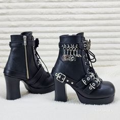 3 3/4" (95mm) Heel, 1 1/4" (32mm) Platform Adjustable Lace-Up Front Ankle Boots Heart Spider Web Buckle Top Strap W/ D-Rings W/ Various Dangling Charms And Bottom Heel Wrapping Harness & Buckle Dual Straps, Inside Metal Zip Closure New In Box Authentic Demonia Punk Closed Toe Heels For Fall, Punk Style Closed Toe Heels For Fall, Punk Ankle-high Platform Boots With Reinforced Heel, Punk Chunky Platform Closed Toe Boots, Chunky Platform Punk Boots, Punk Style Chunky Platform Boots, Emo Platform Boots For Halloween Concerts, Edgy Platform Heels For Alternative Fashion, Punk Ankle-high Platform Heeled Boots