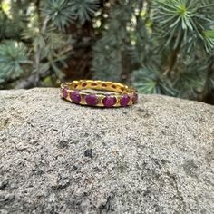 Notches Offer A View Of Each Faceted Ruby, Circling Fully Around Our 18kt Gold-Plated Sterling Silver Band. Exclusive. Sundance Jewelry, Ring Color, Ruby Ring, Sterling Silver Bands, Gold Plated Sterling Silver, Womens Jewelry Rings, Silver Band, Color Purple, Ruby