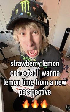 a person wearing a hat and making a funny face with the caption strawberries lemon corrected wanna lemon line from a new perspective