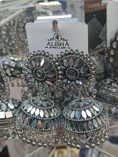 an assortment of jewelry is on display in a store