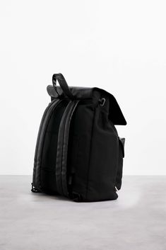 Rucksack Black Front in Workplace Utility Travel Backpack, Utility Travel Backpack With Adjustable Strap, Functional Leather Backpack, Practical Black Backpack For Trips, Utility Backpack With Functional Pockets For Travel, Utility Backpack With Multiple Pockets For Travel, Utility Travel Backpack With Multiple Pockets, Backpack With Functional Pockets For Trips, Functional Backpack With Pockets For Trips