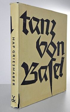 an old book with graffiti written on it's front cover and the title in black ink