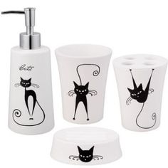 three pieces of bathroom accessories with black cats on them