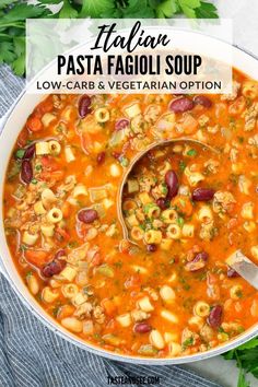 italian pasta and fagioli soup in a white bowl with a spoon