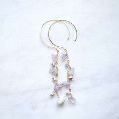 "Dainty Amethyst stones dangle from 2\" gold filled chains and hang from hammered 20g gold filled ear wires." Gold Amethyst Dangle Chandelier Earrings, Lavender Dangle Earrings With Ear Wire, 14k Gold Filled Jewelry With Dangling Beads, 14k Gold-filled Jewelry With Dangling Beads, Gold Amethyst Chandelier Earrings As Gift, Lavender Dangle Jewelry With Dangling Beads, Amethyst Earrings Gold, Sunset Quotes Instagram, Amethyst Stones