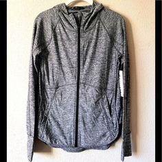 Nwt Athleta Heather Baja Jacket Size Xs Petite Heather Gray Polyester/Nylon/Lycra Spandex Unstinkable - Wear It More. Wash It Less Natural Silver Salts Give The Fabric Antimicrobial Protection That Lasts Wash After Wash Rated Upf 50+ Machine Wash & Dry New And Never Worn - Excellent Pre-Owned Condition Light Jacket With 2 Front Zip Pockets, Thumbholes Fast Drying, Highly Breathable, Unstinkable Fabric Has A Longer Length And Hood Fall Sporty Running Track Jacket, Sporty Track Jacket For Running In Fall, Gray Functional Moisture-wicking Track Jacket, Gray Moisture-wicking Functional Track Jacket, Functional Gray Moisture-wicking Track Jacket, Functional Sports Track Jacket With Thumbholes, Gray Moisture-wicking Track Jacket, Gray Activewear For Sports In Fall, Gray Sporty Track Jacket With Moisture-wicking