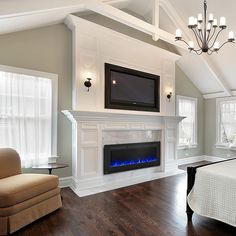 an image of a bedroom with fireplace and bed