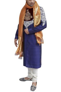 Blue sherwani with hand leaf work bodice.
Components: 1
Neckline: Mandarin collar
Sleeve Length: Full sleeves
Fabric: Raw Silk
Color: Blue
Zardozi embroidery
Note: The churidar and stole  worn by the model are not for sale. - Aza Fashions Blue Sherwani, Embroidered Sherwani, Zardozi Embroidery, Sherwani For Men, Fashion App, Churidar, Full Sleeves, Embroidered Silk, Raw Silk