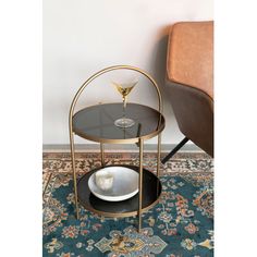 A round side table with a tempered glass top and undershelf framed in gold-finished metal. Maeve by DF is a timeless piece with a delicately elegant silhouette. Luxury Furnitures | Luxury Furnitures Maeve Glass End Table 27.0 H x 17.0 W x 17.0 D in / yellowGlass in Black | 27" H X 17" W X 17" D | Wayfair Shabby Chic Sofa, Dutch Furniture, Fall Bedding, Tempered Glass Table Top, Glass End Tables, Luxury Towels, Round Side Table, Glass Top Table, Beds For Sale