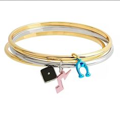 Coach Retro Charm Bangle Bracelet Set Multi In Goldtone And Silvertone. Dice Charm, Music Charm, And “C” Charm Coach Jewelry, Fun Bracelet, Bangle Bracelet Set, Hinged Bracelet, Bangle Bracelets With Charms, Gold Bangle Bracelet, Silver Bangle Bracelets, Charm Bangle, Bangle Set