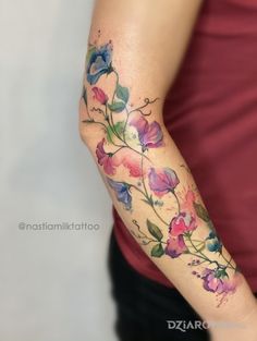 | Creative Tattoos For Women by  Haylee Burk Creative Tattoos For Women, Watercolor Tattoo Sleeve, Flower Vine Tattoos, Colour Tattoo For Women, Feminine Tattoo Sleeves, Flower Wrist Tattoos