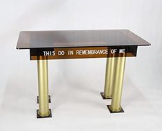 this is an image of a desk with a sign on it that says, this do in remembrance of me