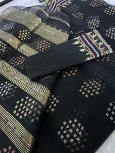 "This beautiful handmade Dhakai Jamdani Saree all the way from original traditional craftsman from Bangladesh \"Jamdani (Bengali: জামদানি) is a fine muslin textile produced for centuries in South Rupshi of Narayanganj district in Bangladesh. \" Product Description: Saree Type :Jamdani Thread Count: 84 Blouse Piece : Have Blouse Piece (Unstitched) Pico: Done Saree Fabric : Half Silk Color : As shown in the photo Disclaimer: slightly color variations may be possible due to light effects!" Ceremonial Cotton Silk Traditional Wear With Cutdana, Bohemian Handloom Traditional Wear For Wedding, Black Cutdana Traditional Wear For Ceremonial Occasions, Ceremonial Black Traditional Wear With Cutdana, Ceremonial Tussar Silk Sets With Cutdana, Unstitched Bohemian Traditional Wear With Woven Motifs, Ceremonial Tussar Silk Traditional Wear With Cutdana, Traditional Sets With Weaving Work For Ceremonies, Traditional Sets With Woven Motifs For Ceremonies