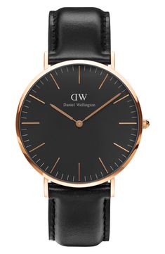 A lightweight round case is the epitome of graceful simplicity with its clean dial rounded by stick indexes and a slender polished bezel. Secured by a luxe topstitched Italian-leather strap, this watch delivers a modern look that is elegant for every day. Style Name:Daniel Wellington Classic Sheffield Leather Strap Watch, 40mm. Style Number: 5856013. Daniel Wellington Watch, Gold Watch Men, Leather Strap Watch, Womens Watches Luxury, Rose Gold Watches, Jewelry Amazon, Unisex Watches, Rose Gold Watch, Gold Leather