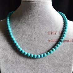 jewelry: man-made turquoise necklace colour: turquoise color Diameter: 8mm shape: round Necklace length: select Clasp: lobster Clasp, IF YOU LIKE IT WITHOUT A CLASP,PLEASE LET ME KNOW. Packing:Beautiful Pouch Click on the image(s) for larger view If you want to order of different style. Please feel free contact me . Thank you for your viewing. The other turquoise necklaces: https://www.etsy.com/shop/weddingpearl/search?search_query=turquoise+necklaces&order=date_desc&view_type=list&r Statement Necklace Wedding, Turquoise Necklaces, Genuine Pearl Necklace, Real Pearl Necklace, Pearl Necklace Wedding, Turquoise Bead Necklaces, White Pearl Necklace, Black Bead Necklace, Round Necklace