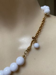 "You must have at least one set of white jewelry just for summer. White pearls don't count. I'm talking fun stuff. Necklace is signed Napier and earrings signed Trifari. Necklace will extend from 16 to 18\" with a hook clasp. Largest front beads are about 18 and 20mm round. They continue to be fairly big at about 10mm near clasp. Earrings are clip backs marked Trifari. Big look at 3\" but the largest section is against the earlobe. Not heavy anyway but I think the largest bead at top is a good i White Pearl Chain Jewelry For Party, Modern White Necklace With Pearl Charm, Modern White Necklaces With Pearl Charm, White Dangle Necklace For Party, Pearl White Jewelry With Lobster Clasp, Modern White Jewelry With Lobster Clasp, Modern Round Pearl Chain Jewelry, White Polished Pearl Necklace For Formal Occasions, Modern White Pearl Chain Necklace