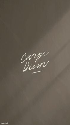 the words carpe dien are written on a black surface with white writing in it