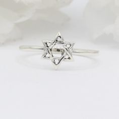 Item Specifications: Face Height: 8.7 mm Finish: Oxidized Metal Material: Sterling Silver Custom orders welcome! Sterling Silver Star-shaped Spiritual Rings, Spiritual Sterling Silver Star Rings, Silver Star-shaped Spiritual Rings, Spiritual Silver Star-shaped Rings, Sterling Silver Star Of David Ring Gift, Silver Star Of David Ring In Spiritual Style, Symbolic Sterling Silver Star Of David Ring, Silver Spiritual Rings With Star Of David, Silver Star Of David Spiritual Rings