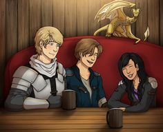 three people sitting at a table in front of a dragon