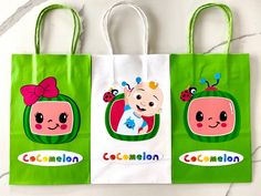 two shopping bags with cartoon characters on them