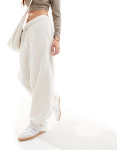 Joggers by ASOS DESIGN Can't go wrong in sweats Elasticated drawstring waist Functional pockets Turn-up hems Oversized fit Relaxed Wide-leg Joggers For Loungewear, Athleisure Wide-leg Relaxed Fit Joggers, Baggy High-waisted Joggers For Loungewear, Relaxed Fit Wide-leg Leisure Joggers, Cream Cotton Joggers For Loungewear, Pull And Bear Grey Pants, Cute Joggers, Ensemble Jogging, Straight Leg Joggers