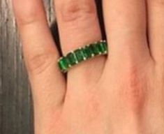 Beautiful and trendy green ringPerfect for all ages!!This piece would make a great gift for yourself or a loved one!Ring is:-sterling silver -gold plated-comes in sizes 5-9-stamped "925"** in the "letter to seller" section please include your email address**Free shipping!!Request a gift box if your item is a gift, free of charge!If you have questions please don't hesitate to ask. Happy shopping!! Formal Green Half Eternity Jewelry, Classic Green Eternity Band As A Gift, Green Eternity Band With Prong Setting As Gift, Green Baguette Cut Stackable Rings, Green Emerald Stackable Ring With Baguette Cut, Green Baguette Cut Stackable Emerald Ring, Stackable Emerald Cut Emerald Ring For Anniversary, Green Stackable Eternity Band For Formal Occasions, Green Stackable Emerald-cut Jewelry