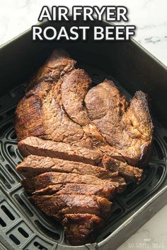 an air fryer roast beef on the grill with text overlay that says air fryer roast beef