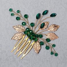 Introducing our exquisite Green Flower Rhinestone Hair Clip, the perfect accessory to elevate your hairstyle and showcase your unique feminine elegance. Crafted from high-quality alloy and adorned with sparkling, fade-resistant emerald green crystals, this hair clip is not only stylish but also durable and long-lasting. Our hair clip features a lightweight and delicate design that can effortlessly complement various hairstyles such as curls, messy hair, buns, and braids. Whether you're attending Messy Hair Buns, Bride Hair Comb, Buns Braids, Comb For Curly Hair, Decorative Hair Combs, Clear Hair, Hair Comb Clips, Pearl Hair Combs, Rhinestone Hair Comb