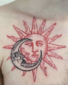 a man's chest with a sun and moon tattoo design on the left side